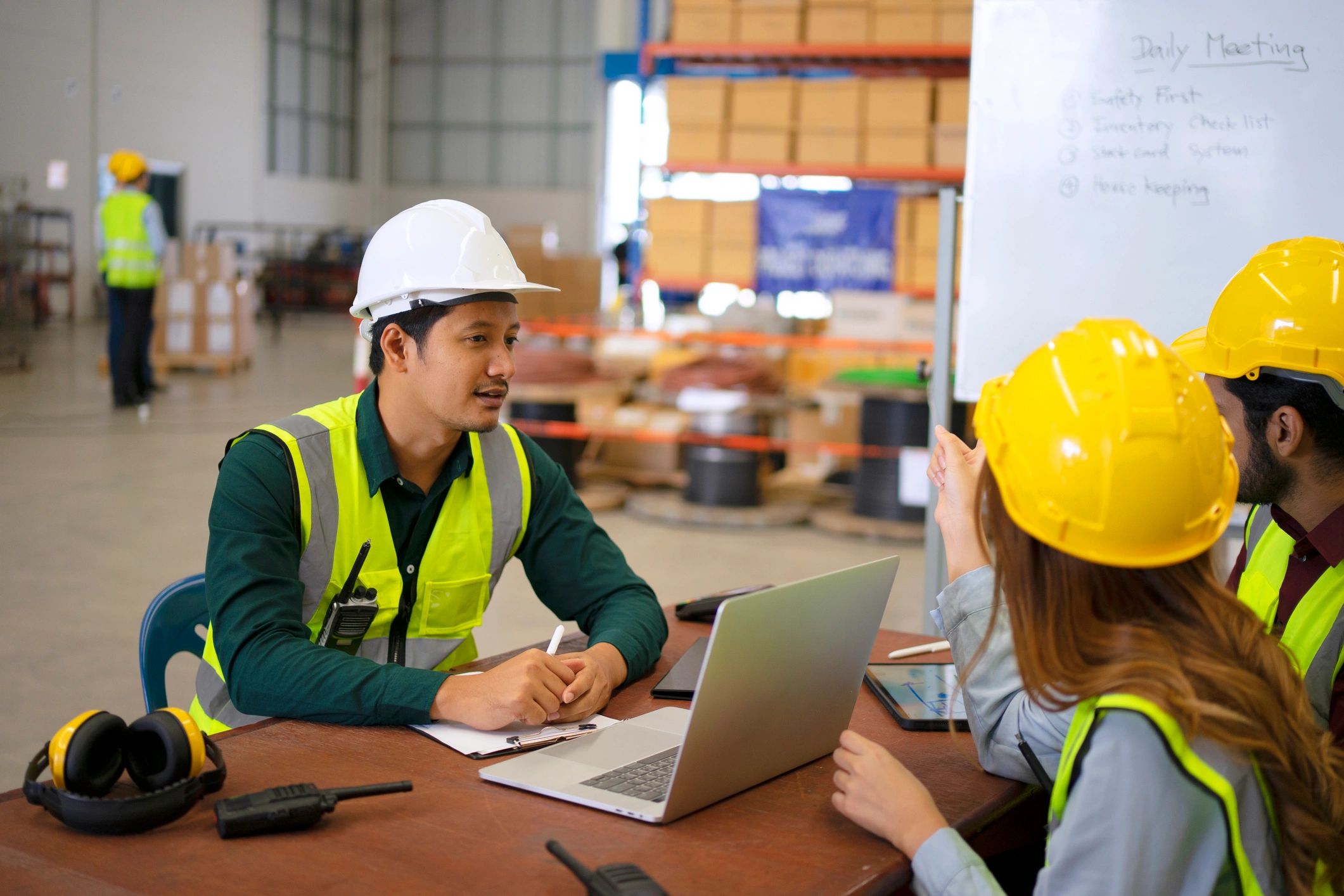 Supply chain team working on site