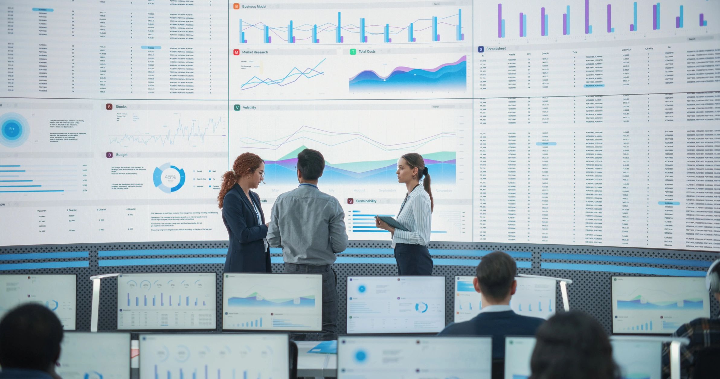 Business team reviewing logistics data